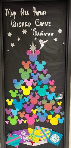 a door decorated with mickey mouses and wishes for someone's new year celebration