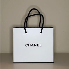 Brand New X-Small Chanel Shopping Bag 5 1/2” X 4 3/4” X 2” Designer Shopping Bags, Chanel Shopping Bag, Branded Shopping Bags, Chanel Shopping, Paris Theme Party, Retirement Party Decorations, Chanel White, Consumer Insights, Paris Theme