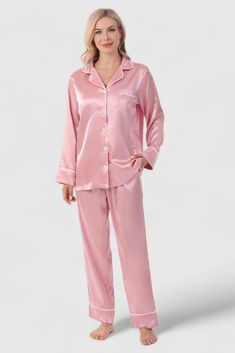 Indulge in ultimate comfort with the luxurious PearlSilk™ Pajama Set. Made from high-quality vegan silk satin, this 2-piece ensemble is cool, breathable, and exquisitely soft and silky to the touch. Enjoy a blissful sleep that is free of discomfort, with less sweating and hot flashes. Perfect for restful slumber, the PearlSilk™ pajama set is the ultimate in attainable luxury & comfort. Tired of pajamas that don’t look flattering nor feel great? Too many times we find ourselves wearing clothes at Pink Silk Pajamas, Silky Pajamas, Black Pajamas, Pyjama Satin, Silk Pajama Set, Satin Long Sleeve, Pajamas Comfy, Soft Pajamas, Satin Pyjama Set