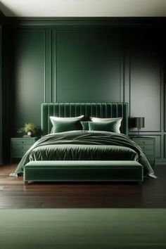 a bedroom with green walls and a bed in the middle, along with two nightstands