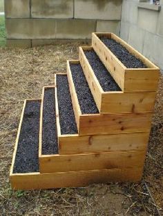 some steps made out of wood and gravel