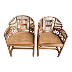 pair of bamboo chairs on white background