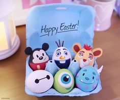 an egg carton filled with lots of cartoon characters