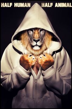 a person wearing a hoodie with a lion face on it's chest and hands in front of them