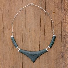 An impressive pointed stone of dark green jade is flanked by two smaller stones. This striking statement necklace from Guatemala features a design by Zandra Lorena Sajbin who draws inspiration from traditional Mayan jewelry. Mayan Necklace, Mayan Jewelry, Guatemalan Art, Iron Jewelry, Mayan Art, Jewelry Materials, Snake Jewelry, Handcrafted Rings, Jade Jewelry