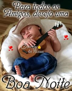 a baby is sleeping in a basket with a guitar