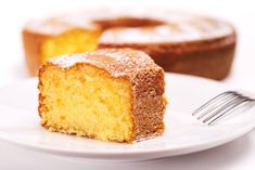 a piece of cake sitting on top of a white plate