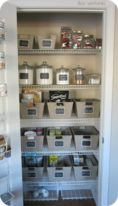 an organized pantry with bins and containers