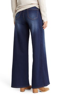 Made with your child's and the earth's future in mind, these wide-leg maternity jeans are cut from soft stretch denim produced using recycled materials. 33" inseam; 25" leg opening 56% cotton, 22% REPREVE® recycled polyester, 21% rayon, 1% spandex REPREVE recycled polyester is made from 100% post-consumer recycled plastic bottles Machine wash, tumble dry Imported Wide Leg Jeans Maternity Outfit, Maternity Jeans Flare, Wide Leg Maternity Jeans, Plus Size Maternity Jeans, Stretch Denim Maternity Bottoms, Maternity Jeans, High Rise Jeans, Wide Leg Denim, Bell Bottom Jeans