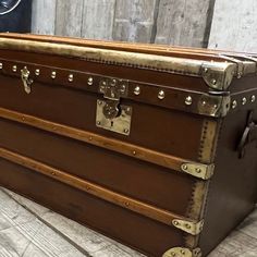 an old trunk is sitting on the floor