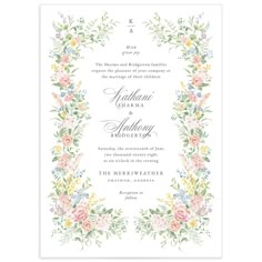 a wedding card with watercolor flowers and greenery