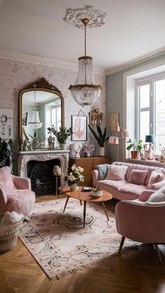 a living room filled with furniture and a fire place under a chandelier on top of a hard wood floor