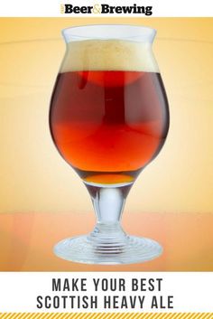 a glass filled with beer sitting on top of a table next to a yellow background