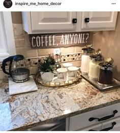 a kitchen counter with coffee mugs and other items on it that says coffee anyone?