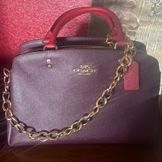 Boysenberry Colorsold Out. This Bag Is Gorgeous. The Color Combination Is Beautiful. In Great Condition, Comes With Dustbag And Crossbody Strap. Does Not Include Chain Chic Burgundy Shoulder Bag With Branded Hardware, Burgundy Rectangular Satchel With Branded Hardware, Burgundy Top Handle Shoulder Bag With Branded Hardware, Formal Burgundy Bags With Branded Hardware, Burgundy Satchel Bag With Gold-tone Hardware, Burgundy Crossbody Shoulder Bag With Branded Hardware, Burgundy Bags With Branded Hardware For Daily Use, Luxury Burgundy Coach Bag, Evening Burgundy Bag With Branded Hardware