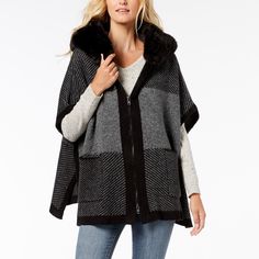 Heavyweight And Warm, This Knit Poncho Features A Front Zip Closure And Attached Hood With Stylish Faux Fur Trim. Fit: This Style Is One Size Fits Most. Attached Hood With Faux Fur Trim. Short Dolman Sleeves. Front Zip Closure. Front Patch Pockets. - Allover Stripe Print. - Vented Hem. - Knit Construction. - Approx. 30" Length (Size Os). - Body: 100% Acrylic. - Faux Fur: 88% Acrylic, 12% Polyester. - Bust: 33". Waist: 24". Hips: 34". - Model Is Wearing Size Os. - Color: Gray Black Cape Coat, Steve Madden Jacket, Plaid Capes, Steve Madden Handbags, Knitted Cape, Knit Poncho, Hooded Poncho, Poncho Sweater, Knitted Poncho