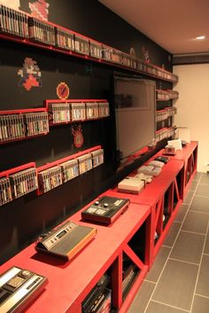 there are many shelves with video games on them