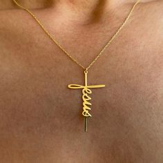 This beautifully crafted 14k gold Jesus name necklace, designed in the shape of a cross, is perfect for commemorating religious milestones such as baptisms or confirmations. Its simple yet meaningful design is a powerful symbol of faith and devotion. Made from high-quality solid gold, this necklace combines elegance with spiritual significance, making it an ideal gift for Christian celebrations. Key Features: *Material: 14k solid gold *Customization: Laser engraving available *Craftsmanship: Han Order Packaging, Meaningful Design, Gift Box Design, Jesus Name, Religious Cross, Christian Jewelry, Names Of Jesus, Elegant Gift, Name Necklace