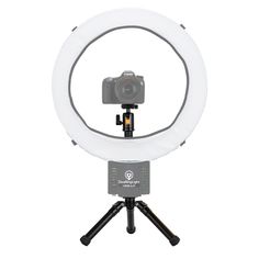 the ring light is on top of a tripod