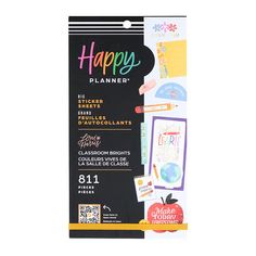 the happy planner bookmark is packaged in a black package with colorful stickers on it