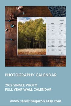 a calendar with trees on it and the words photography calendar 2021 single photo full year wall calendar