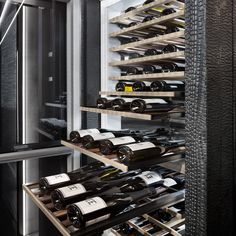 a wine cellar filled with lots of bottles