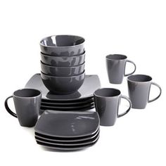 a set of gray dishes and cups on a white background