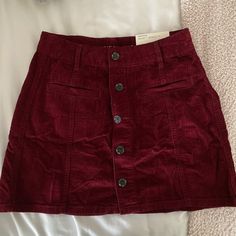 American Eagle High Waisted Skirt, New With Tags Red Mini Skirt With Pockets, Red Mini Skirt With Button Closure, Burgundy Mini Skirt With Lining, Casual Burgundy Mini Skirt, Burgundy Mini Skirt With Lined Detail, Burgundy Lined Mini Skirt, High Waist Red Mini Skirt With Pockets, Burgundy Lined Skirt, Red Button Closure Skirt For Spring