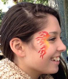 Flames Face Paint, Fire Face Painting, Fire Makeup Halloween, Fire Face Paint, Flame Eye Makeup, Flame Makeup, Voodoo Makeup