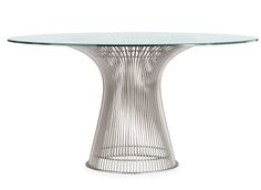 an oval glass table with metal wire base and round glass top, on a white background