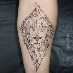 a lion tattoo on the right arm with geometrical shapes around it's head