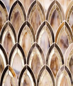 a close up view of a decorative wall tile