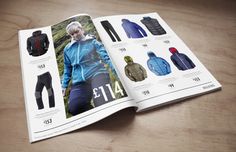 an open magazine with pictures of men's clothing on the front and back pages