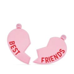 two pink heart shaped brooches with the words best friends written on one side