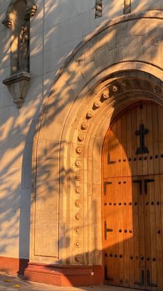 an old church with a large wooden door