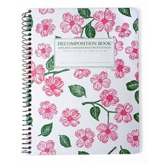 a white notebook with pink flowers on it