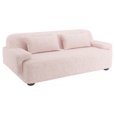 a pink couch sitting on top of a white floor