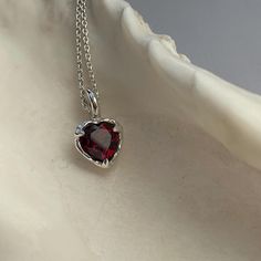 An organic take on a classic! Sterling silver pendant with a heart shaped Garnet. This pendant is available in Garnet and Green Quartz.  Jewellery features ~  ~ pendant measures 9 x 16mm ~ bolt clasp fastening  ~ trace chain 1.1mm Green Quartz, Garnet Gemstone, Perfect Gift For Her, A Heart, Gemstone Pendant, Gold Vermeil, Heart Pendant, Sterling Silver Pendants, Favorite Jewelry