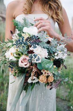 a woman holding a bouquet of flowers in her hand and an instagram page on the bottom right