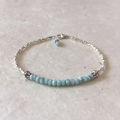 Beautiful!   Etsy listing at https://www.etsy.com/listing/290455973/larimar-karen-hill-tribe-thai-silver Sundance Style Jewelry, Dangle Bracelet, Sundance Style, Beads Bracelet Design, Silver Bead Bracelet, Bracelet Diy, Mesa Az, Beaded Bracelets Diy, Dainty Bracelets