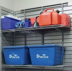 three bins are on the shelves with plastic containers