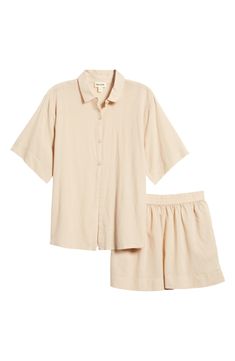 Crisp PJs with a collared short-sleeve shirt and elastic-waist shorts are ones you'll want to wear all weekend long. 26 1/2" length top; 2 1/2" inseam; 31" leg opening; 12 1/2" front rise; 16" back rise (size Medium) Top has front button closure; notched collar; short sleeves; chest patch pocket Shorts have elastic waist 55% cotton, 45% viscose Machine wash, tumble dry Imported Spring Relaxed Fit Collared Sets, Spring Daywear Short Set, Relaxed Fit Short Set For Spring Loungewear, Relaxed Fit Short Set For Spring Pajama Party, Spring Relaxed Fit Short Set For Pajama Party, Spring Short Sleeve Sleepwear Set, Spring Pajama Party Short Set With Relaxed Fit, Beige Collared Sets For Summer, Beige Collared Summer Set