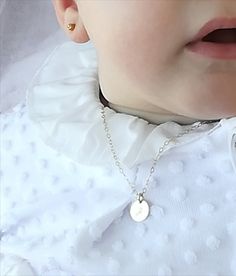 "An initial disc necklace made with one 14k Gold Filled or 925 sterling silver disc which we handstamped with the letter you prefer, hanged from a dainty thin 14k Gold Filled or 925 sterling silver chain! This necklace will be the perfect gift to show your infinity love and protection! Perfect for your baby, your girl, for a newborn! QUALITY - 14K Gold Filled (not plated) or 925 Sterling Silver chain and components (A' quality USA materials) - 14k Gold Filled (not plated) or 925 Sterling Silver Jewelry For Baby Girl, Baby Girl And Mom, Toddler Jewelry, Tiny Cross Necklace, Grandmother Jewelry, Flower Girl Jewelry, Initial Disc Necklace, Baby Necklace