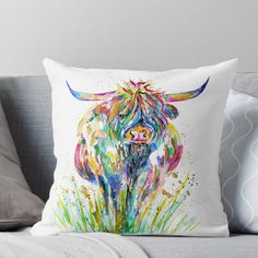 a watercolor painting of a bull with horns on it's head throw pillow