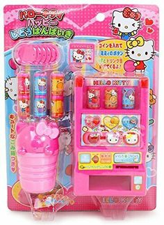 a pink hello kitty toy vending machine