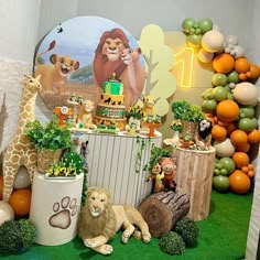 an animal themed birthday party with balloons and decorations