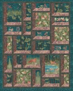 a quilted wall hanging with trees and animals in the woods on it's sides