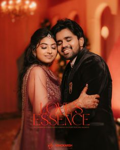 a man and woman embracing each other in front of a red background with the words love's essence