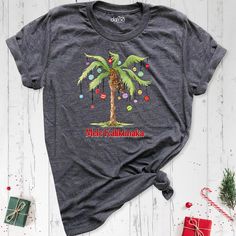 a t - shirt with a palm tree on it