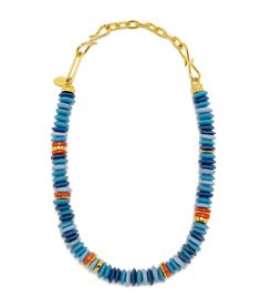 a blue and orange beaded necklace on a gold plated bracelet with an adjustable clasp